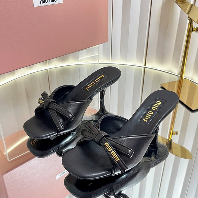 MIUMIU 26S MULE SANDALS 55MM IN BLACK CALFSKIN WITH BOW