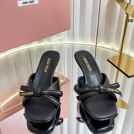 MIUMIU 26S MULE SANDALS 55MM IN BLACK CALFSKIN WITH BOW