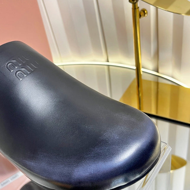 MIUMIU 26S CLOG MULES IN BLACK CALFSKIN