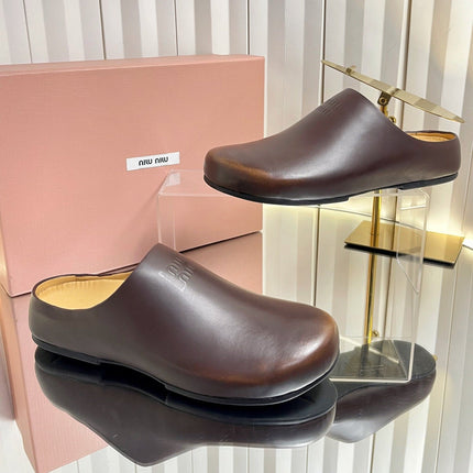 MIUMIU 26S CLOG MULES IN DARK BROWN CALFSKIN