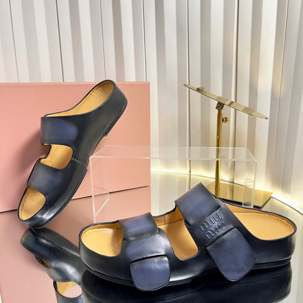 MIUMIU 26S DOUBLE-STRAP SLIDES IN BLACK CALFSKIN