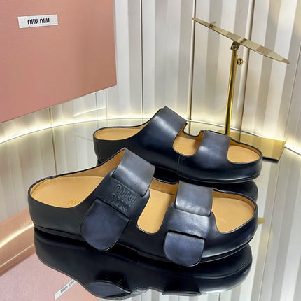 MIUMIU 26S DOUBLE-STRAP SLIDES IN BLACK CALFSKIN