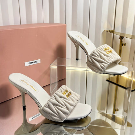 MIUMIU 26S HIGH-HEEL MULE SANDALS 85MM IN LIGHT BEIGE CALFSKIN GOLD HARDWARE