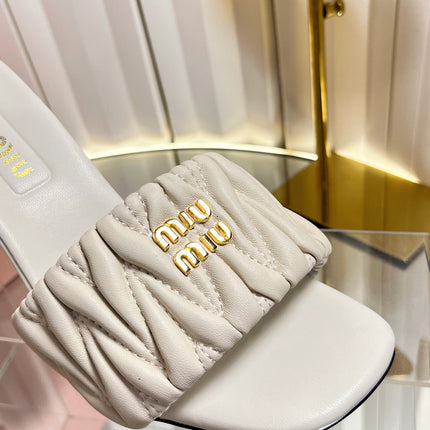 MIUMIU 26S HIGH-HEEL MULE SANDALS 85MM IN LIGHT BEIGE CALFSKIN GOLD HARDWARE