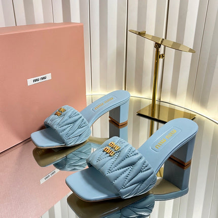 MIUMIU 26S PADDED MATELASSE MULE HEELS 65MM IN LIGHT BLUE CALFSKIN GOLD HARDWARE
