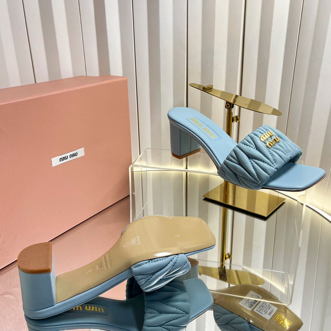 MIUMIU 26S PADDED MATELASSE MULE HEELS 65MM IN LIGHT BLUE CALFSKIN GOLD HARDWARE