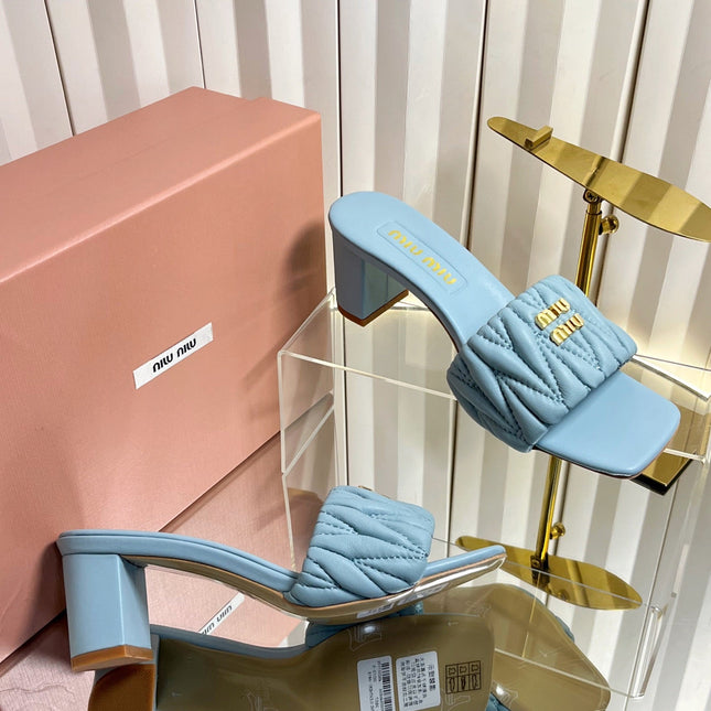 MIUMIU 26S PADDED MATELASSE MULE HEELS 65MM IN LIGHT BLUE CALFSKIN GOLD HARDWARE