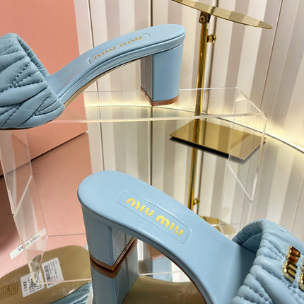 MIUMIU 26S PADDED MATELASSE MULE HEELS 65MM IN LIGHT BLUE CALFSKIN GOLD HARDWARE