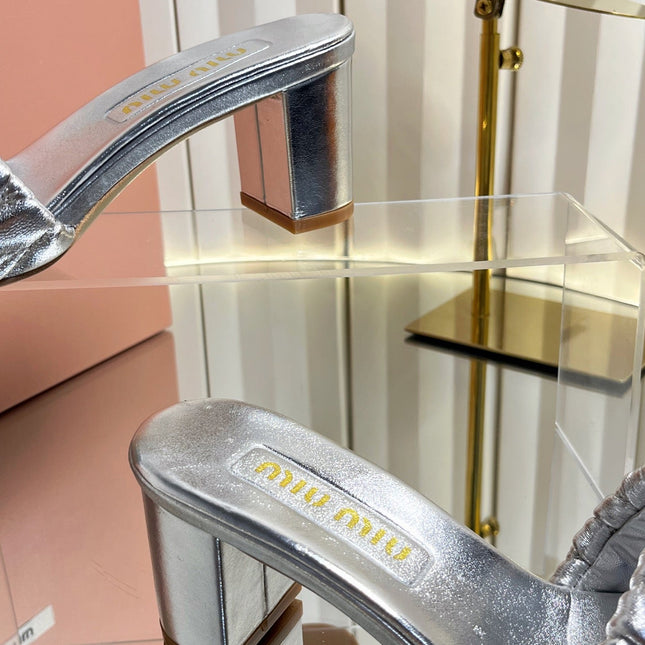 MIUMIU 26S PADDED MATELASSE MULE HEELS 65MM IN SILVER CALFSKIN GOLD HARDWARE