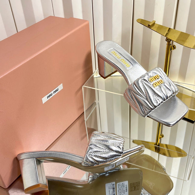 MIUMIU 26S PADDED MATELASSE MULE HEELS 65MM IN SILVER CALFSKIN GOLD HARDWARE