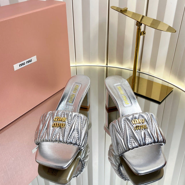 MIUMIU 26S PADDED MATELASSE MULE HEELS 65MM IN SILVER CALFSKIN GOLD HARDWARE