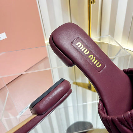 MIUMIU 26S MATELASSE SLIDES IN BURGUNDY RED CALFSKIN GOLD HARDWARE