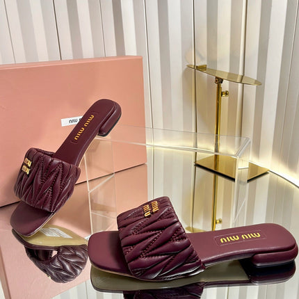 MIUMIU 26S MATELASSE SLIDES IN BURGUNDY RED CALFSKIN GOLD HARDWARE