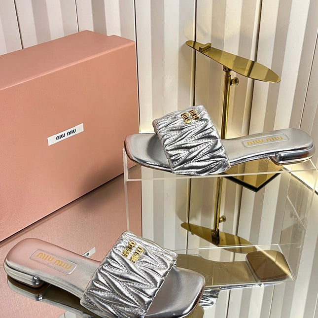 MIUMIU 26S MATELASSE SLIDES IN SILVER CALFSKIN GOLD HARDWARE