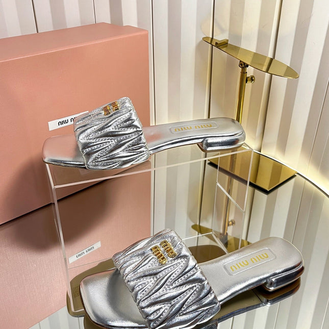 MIUMIU 26S MATELASSE SLIDES IN SILVER CALFSKIN GOLD HARDWARE