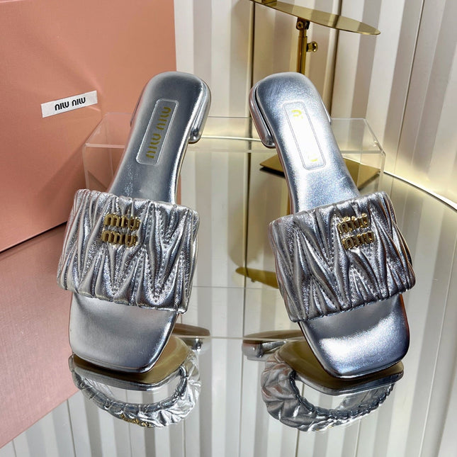 MIUMIU 26S MATELASSE SLIDES IN SILVER CALFSKIN GOLD HARDWARE
