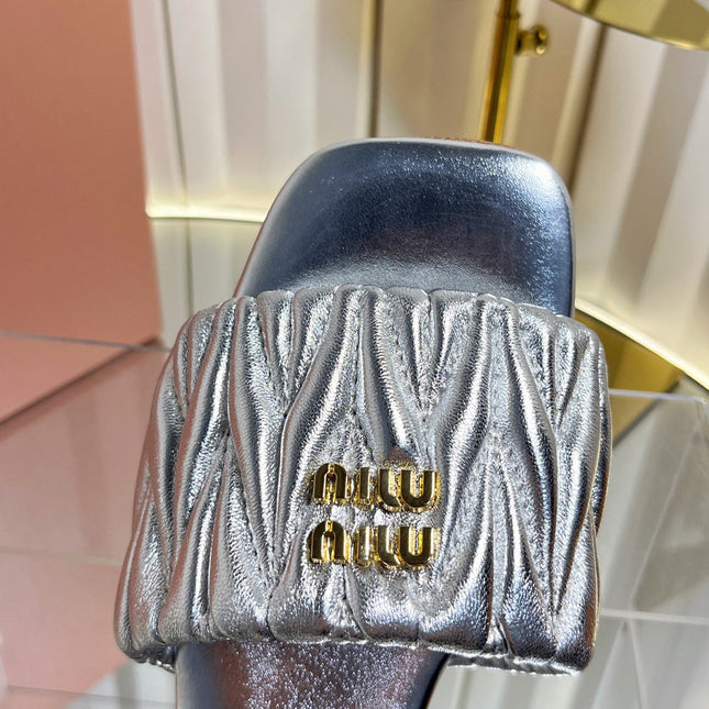 MIUMIU 26S MATELASSE SLIDES IN SILVER CALFSKIN GOLD HARDWARE