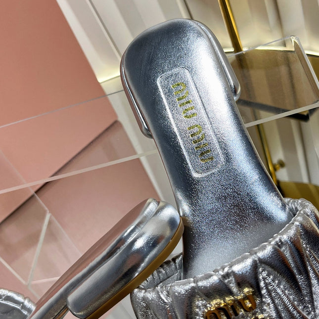 MIUMIU 26S MATELASSE SLIDES IN SILVER CALFSKIN GOLD HARDWARE