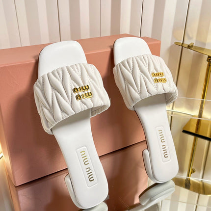 MIUMIU 26S MATELASSE SLIDES IN IVORY WHITE CALFSKIN GOLD HARDWARE
