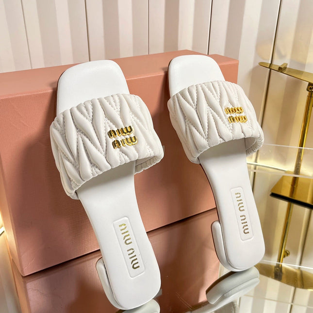 MIUMIU 26S MATELASSE SLIDES IN IVORY WHITE CALFSKIN GOLD HARDWARE