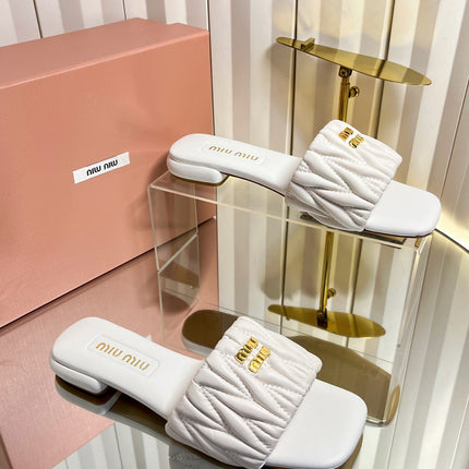 MIUMIU 26S MATELASSE SLIDES IN IVORY WHITE CALFSKIN GOLD HARDWARE