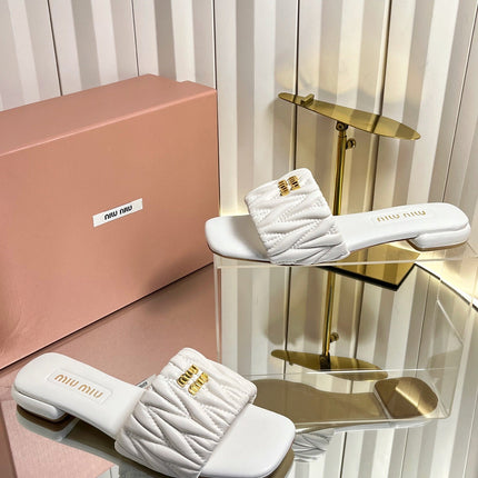 MIUMIU 26S MATELASSE SLIDES IN IVORY WHITE CALFSKIN GOLD HARDWARE