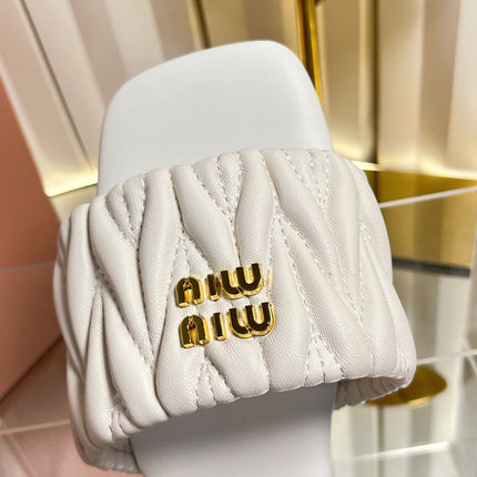 MIUMIU 26S MATELASSE SLIDES IN IVORY WHITE CALFSKIN GOLD HARDWARE