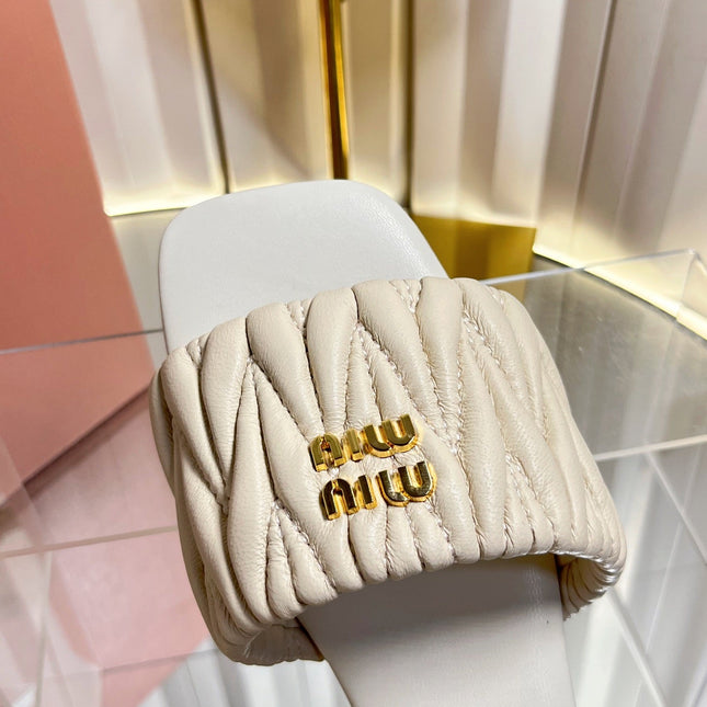 MIUMIU 26S MATELASSE SLIDES IN LIGHT BEIGE CALFSKIN GOLD HARDWARE