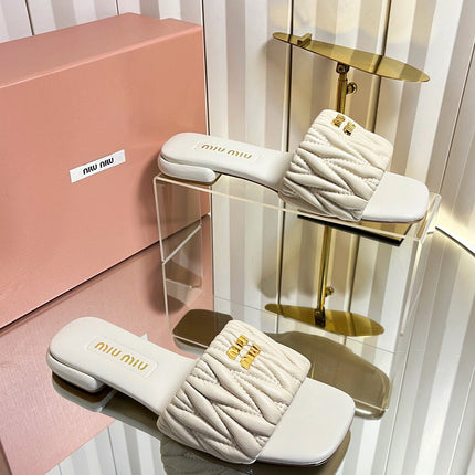 MIUMIU 26S MATELASSE SLIDES IN LIGHT BEIGE CALFSKIN GOLD HARDWARE