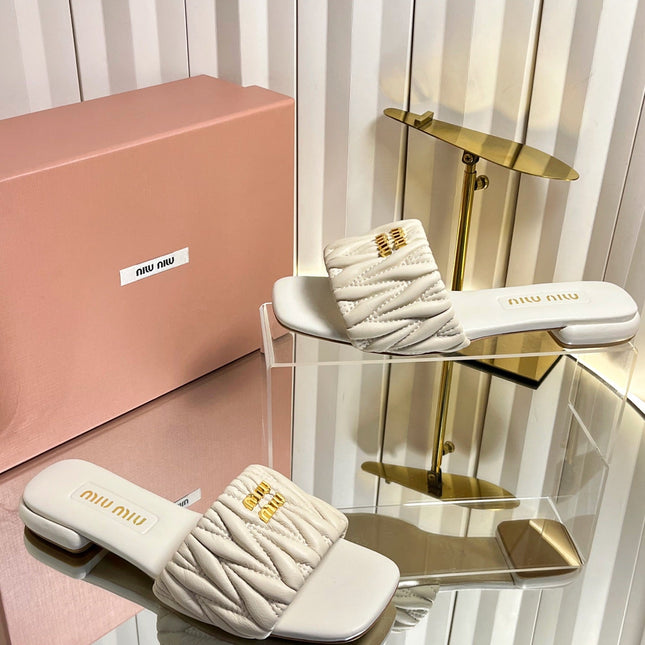 MIUMIU 26S MATELASSE SLIDES IN LIGHT BEIGE CALFSKIN GOLD HARDWARE
