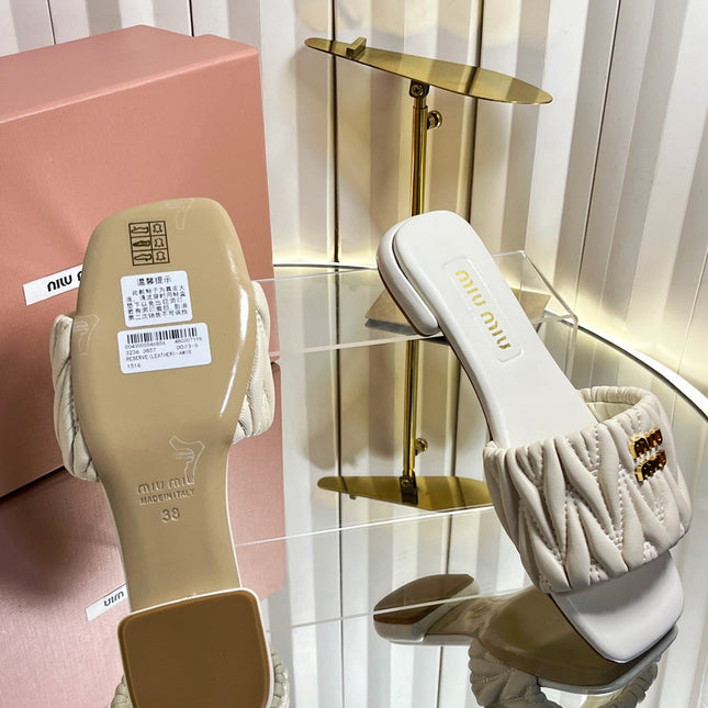 MIUMIU 26S MATELASSE SLIDES IN LIGHT BEIGE CALFSKIN GOLD HARDWARE