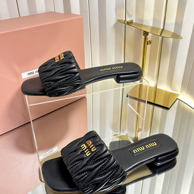 MIUMIU 26S MATELASSE SLIDES IN BLACK CALFSKIN GOLD HARDWARE