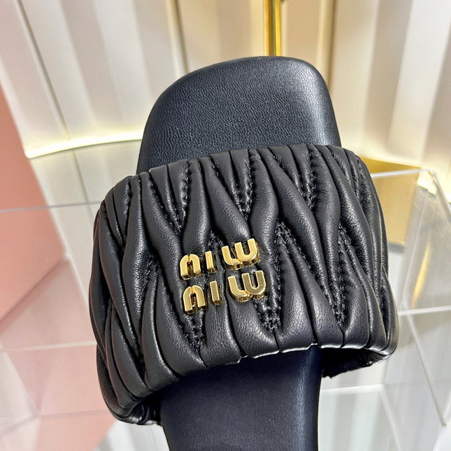 MIUMIU 26S MATELASSE SLIDES IN BLACK CALFSKIN GOLD HARDWARE