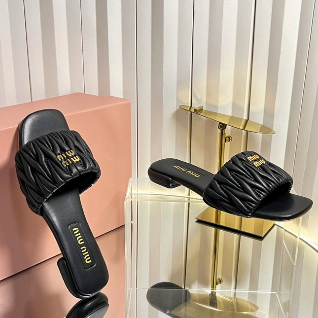 MIUMIU 26S MATELASSE SLIDES IN BLACK CALFSKIN GOLD HARDWARE