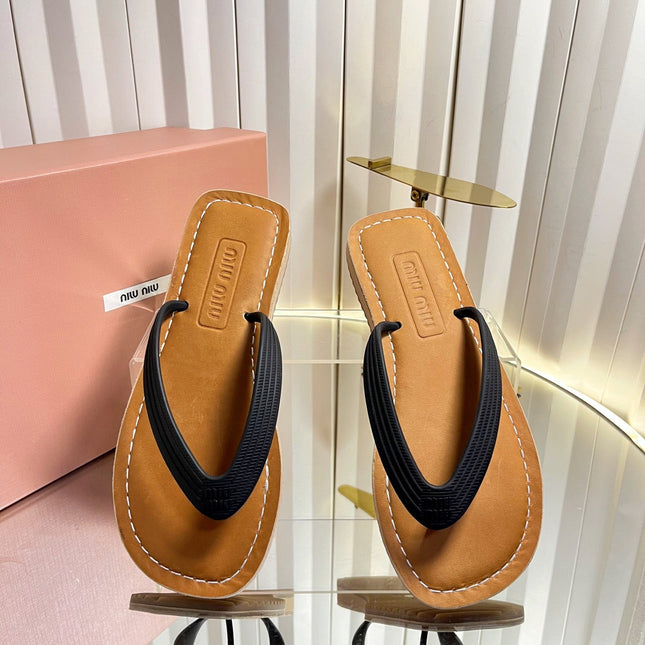 MIUMIU 26S THONG FLAT SANDALS IN BLACK CALFSKIN