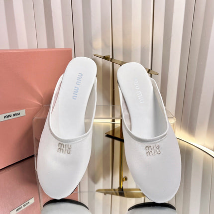 MIUMIU 26S FLAT MULES IN WHITE FABRIC AND LEATHER