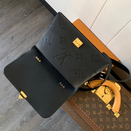 MADELEINE 30 IN BLACK MONOGRAM CALFSKIN EMBOSSED LOGO