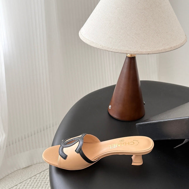 CHANEL MULES IN BEIGE AND BLACK CALFSKIN