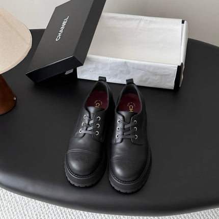 CHANEL 26S LACE UP PLATFORM IN BLACK CALFSKIN