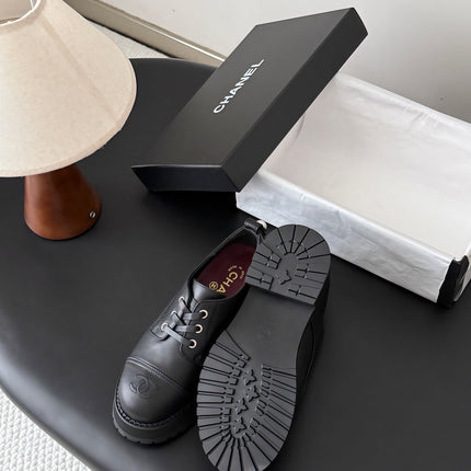 CHANEL 26S LACE UP PLATFORM IN BLACK CALFSKIN