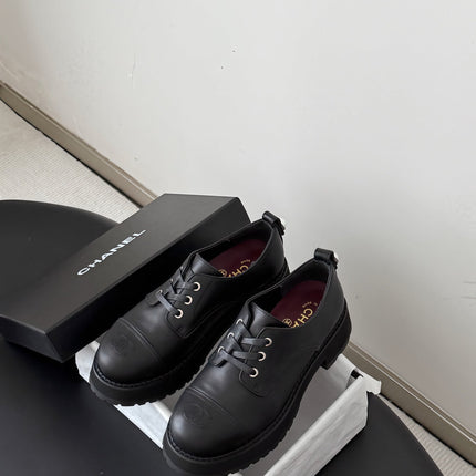CHANEL 26S LACE UP PLATFORM IN BLACK CALFSKIN