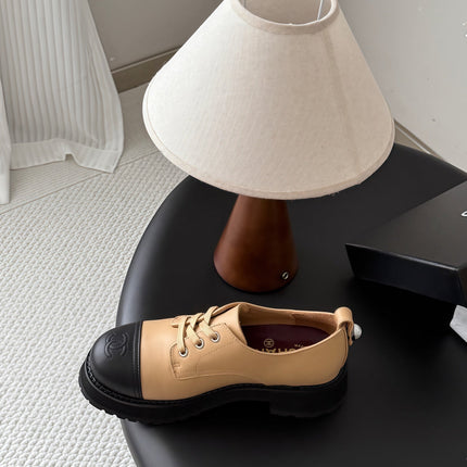 CHANEL 26S LACE UP PLATFORM IN BLACK AND BEIGE CALFSKIN