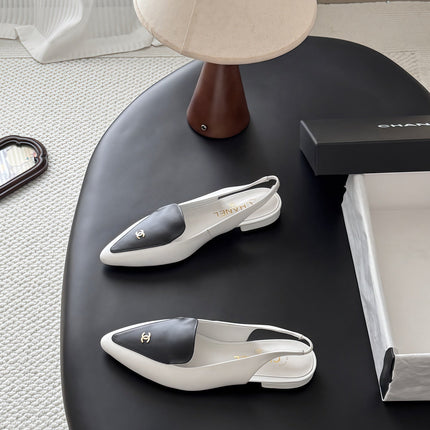 CHANEL 26S SLINGBACK FLAT IN BLACK AND WHITE CALFSKIN