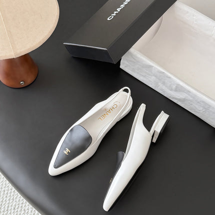 CHANEL 26S SLINGBACK FLAT IN BLACK AND WHITE CALFSKIN