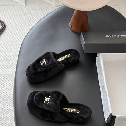 CHANEL 26S MULES IN BLACK SHEARLING LINING