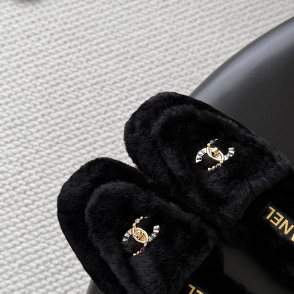 CHANEL 26S MULES IN BLACK SHEARLING LINING