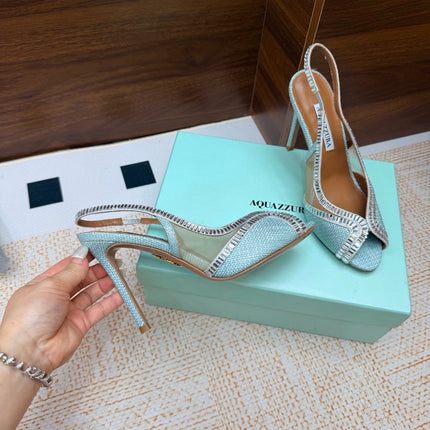 AQUAZZURA 26S HEELED SLINGBACK SANDALS 100 MM IN LIGHT BLUE RAFFIA TEXTURE
