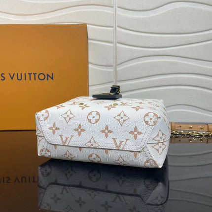 LV ATLANTIS BB 17 IN WHITE MONOGRAM COATED CANVAS