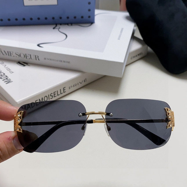 BUTTERFLY EMBELLISHED RIMLESS RECTANGULAR FRAME SUNGLASSES 570245 IN METAL
