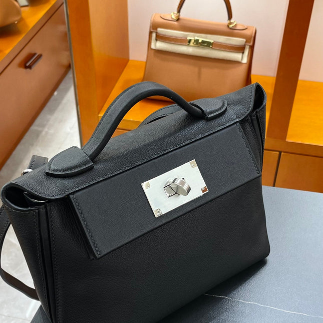 MINI 24/24 21CM IN BLACK EVERCOLOR CALFSKIN SILVER KELLY BUCKLE